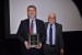 Dr. Nagib Callaos, General Chair, giving Dr. Nicola Fabiano a plaque "In Appreciation for Delivering a Great Keynote Address at a Plenary Session."